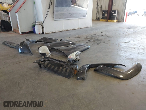 2013 Toyota Tacoma with VIN 3TMLU4EN7DM121253, listed as a IAAI auction lot 42498187 with 145,604 mi miles and . Bid and sale history available at DreamBid. Image 12.