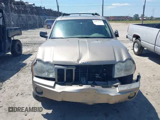 2005 Jeep Grand Cherokee Laredo with VIN 1J4HS48NX5C656582, listed as a IAAI auction lot 42079746 with Not Provided miles and . Bid and sale history available at DreamBid. Image 12.