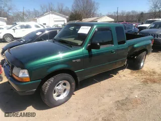 1999 Ford Ranger XLT with VIN 1FTZR15X0XPB29009, listed as a IAAI auction lot 41821351 with 340,456 mi miles. Bid and sale history available at carsss.com. Image 2.