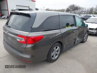 2018 Honda Odyssey EX-L with VIN 5FNRL6H75JB044789, listed as a IAAI auction lot 41625002 with 58,033 mi miles and . Bid and sale history available at DreamBid. Image 4.