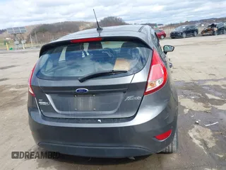 2015 Ford Fiesta SE with VIN 3FADP4EJ0FM117739, listed as a IAAI auction lot 41795558 with 111,000 mi miles. Bid and sale history available at carsss.com. Image 16.