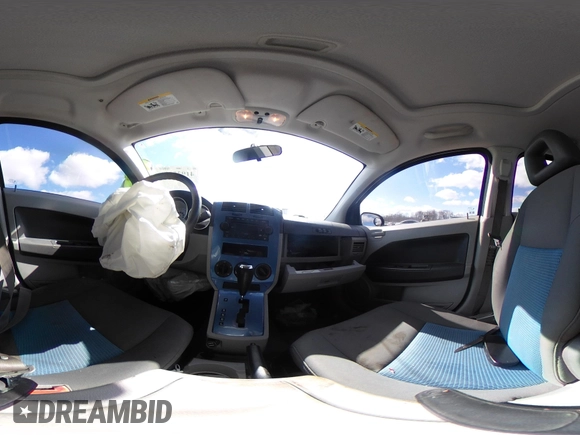 2007 Dodge Caliber SXT with VIN 1B3HB48B67D238157, listed as a IAAI auction lot 41935586 with 115,127 mi miles and . Bid and sale history available at DreamBid. Image 18.