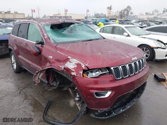 2021 Jeep Grand Cherokee Laredo X with VIN 1C4RJEAG4MC681989, listed as a IAAI auction lot 41571341 with 61,090 mi miles. Bid and sale history available at carsss.com. Image 6.