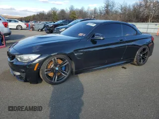 2015 BMW M4 with VIN WBS3U9C55FP967869, listed as a Copart auction lot 86810164 with 69,140 mi miles and Salvage Title. Bid and sale history available at carsss.com. Image 1.