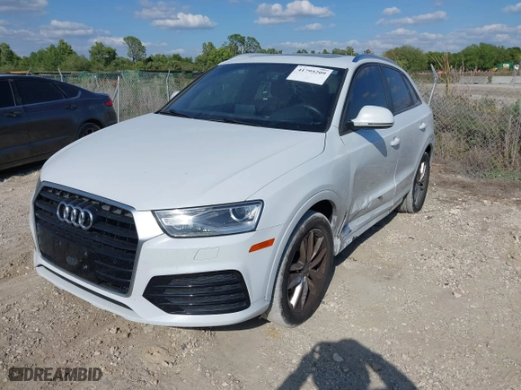 2018 Audi Q3 Premium with VIN WA1BCCFS6JR010047, listed as a IAAI auction lot 41795209 with 99,609 mi miles. Bid and sale history available at carsss.com. Image 17.