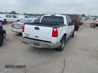 2002 Ford Explorer Sport Trac Value with VIN 1FMZU67E32UB86348, listed as a IAAI auction lot 42304599 with 202,563 mi miles and . Bid and sale history available at DreamBid. Image 4.