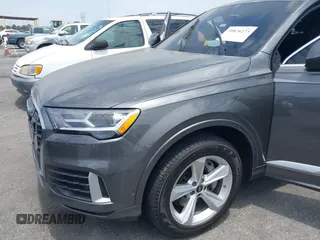 2023 Audi Q7 Premium Plus with VIN WA1LCBF74PD006448, listed as a IAAI auction lot 39876273 with 22,295 mi miles and . Bid and sale history available at DreamBid. Image 6.