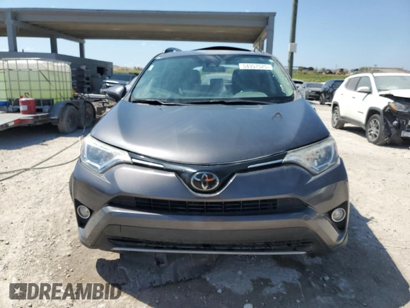 2018 Toyota RAV4 XLE with VIN 2T3WFREV1JW475641, listed as a Copart auction lot 54357525 with 53,609 mi miles and Salvage Title. Bid and sale history available at DreamBid. Image 5.