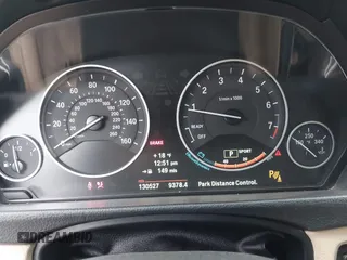 2013 BMW 3 Series 328i xDrive with VIN WBA3B3C50DJ698249, listed as a IAAI auction lot 42303923 with 130,527 mi miles and . Bid and sale history available at DreamBid. Image 7.