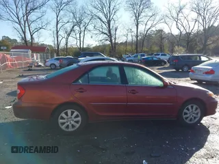 2004 Toyota Camry LE with VIN 4T1BF32K04U074049, listed as a IAAI auction lot 41768724 with 262,296 mi miles and . Bid and sale history available at DreamBid. Image 13.