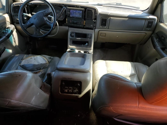 2003 GMC Yukon SLT z VIN 1GKEC13T53J319647, wystawiony jako Copart lot #49014225 z przebiegiem 298 601 mil mil oraz Czysty tytuł • Clean title. Historia ofert i sprzedaży dostępna na DreamBid. Obrazek 8.