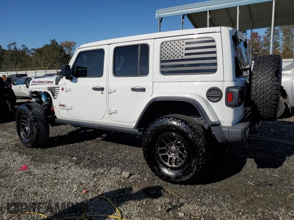 2022 Jeep Wrangler Unlimited Rubicon with VIN 1C4JJXFG2NW125360, listed as a Copart auction lot 76773624 with 22,978 mi miles and Salvage title. Bid and sale history available at DreamBid. Image 2.