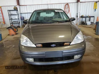 2002 Ford Focus ZX5 z VIN 3FAFP37352R180981, wystawiony jako Copart lot #55856125 z przebiegiem 59 785 mil mil oraz Szkoda całkowita • Salvage title. Historia ofert i sprzedaży dostępna na DreamBid. Obrazek 5.