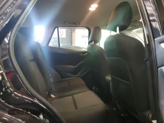 2014 Mazda CX-5 Sport с VIN JM3KE2BE0E0367493, выставлен на аукционе Copart как лот 57324195 с пробегом 103 367 миль миль и Списание • Salvage title. История ставок и продаж доступна на DreamBid. Изображение 11.