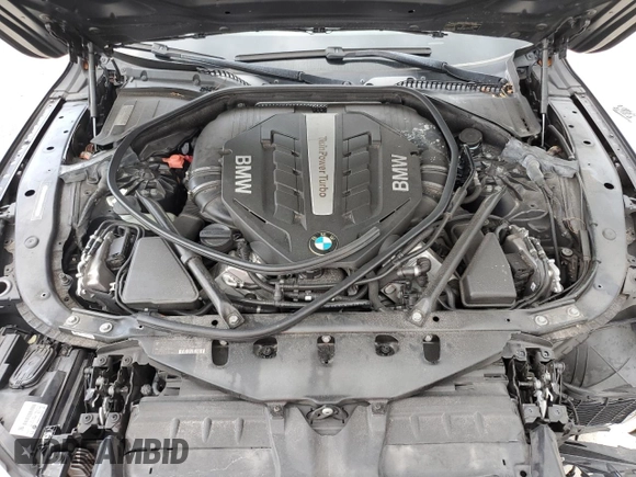 2013 BMW 7 Series 750i with VIN WBAYA8C56DC996704, listed as a Copart auction lot 64466705 with 102,278 mi miles and Salvage title. Bid and sale history available at DreamBid. Image 11.