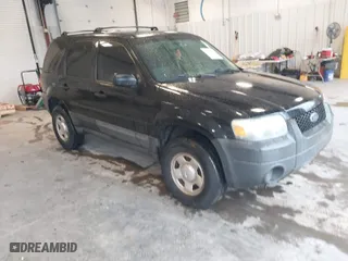 2007 Ford Escape XLS with VIN 1FMYU92Z77KA40092, listed as a IAAI auction lot 41983472 with 138,827 mi miles. Bid and sale history available at carsss.com. Image 1.