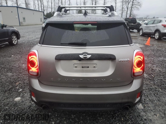 2017 MINI Countryman Cooper S with VIN WMZYT5C33H3D80073, listed as a Copart auction lot 87429094 with 83,566 mi miles and Salvage title. Bid and sale history available at DreamBid. Image 6.