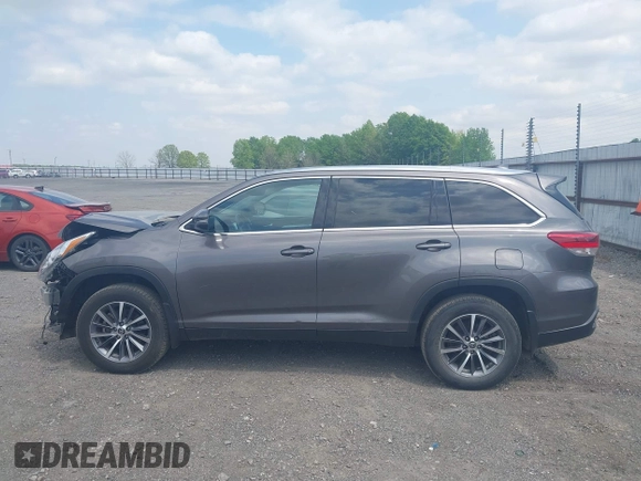 2019 Toyota Highlander SE with VIN 5TDKZRFH3KS353087, listed as a IAAI auction lot 42006593 with 74,214 mi miles and . Bid and sale history available at DreamBid. Image 15.