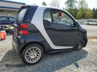 2013 Smart fortwo Pure with VIN WMEEJ3BA9DK670264, listed as a Copart auction lot 52817215 with 51,434 mi miles and Salvage Title. Bid and sale history available at DreamBid. Image 3.