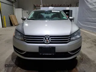 2012 Volkswagen Passat SE z VIN 1VWBP7A36CC081303, wystawiony jako Copart lot #52147655 z przebiegiem 106 446 mil mil oraz Czysty tytuł • Clean title. Historia ofert i sprzedaży dostępna na DreamBid. Obrazek 5.