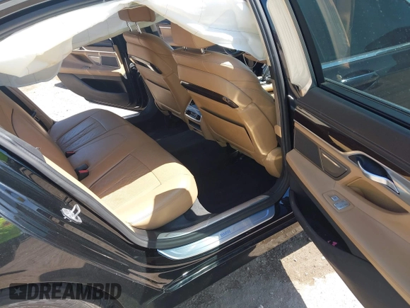 2017 BMW 7 Series 740i xDrive with VIN WBA7E4C50HGU99106, listed as a IAAI auction lot 41997603 with 138,322 mi miles. Bid and sale history available at carsss.com. Image 8.