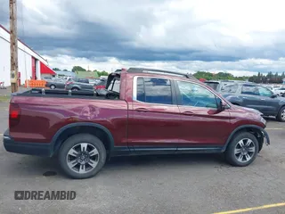 2019 Honda Ridgeline RTL z VIN 5FPYK3F50KB043492, wystawiony jako IAAI lot #42265068 z przebiegiem 86 768 mil mil oraz . Historia ofert i sprzedaży dostępna na DreamBid. Obrazek 14.