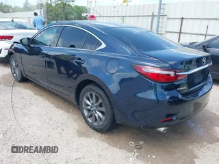 2018 Mazda 6 Sport with VIN JM1GL1UM7J1334658, listed as a IAAI auction lot 41938763 with 129,563 mi miles. Bid and sale history available at carsss.com. Image 3.