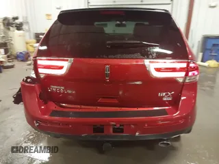 2014 Lincoln MKX z VIN 2LMDJ8JK7EBL00900, wystawiony jako IAAI lot #41714762 z przebiegiem 129 870 mil mil oraz . Historia ofert i sprzedaży dostępna na DreamBid. Obrazek 16.