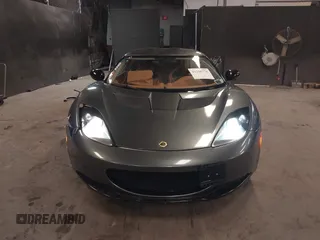 2013 Lotus Evora z VIN SCCLMDSU7DHA10025, wystawiony jako IAAI lot #41298776 z przebiegiem 18 194 mil mil oraz . Historia ofert i sprzedaży dostępna na DreamBid. Obrazek 12.