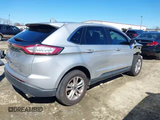 2018 Ford Edge SEL with VIN 2FMPK3J80JBB23016, listed as a IAAI auction lot 41618383 with 100,117 mi miles. Bid and sale history available at carsss.com. Image 4.