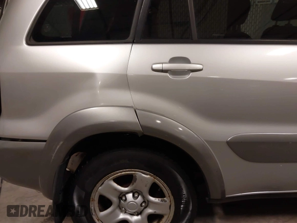 2005 Toyota RAV4 with VIN JTEHD20V250038735, listed as a IAAI auction lot 41853061 with 132,795 mi miles. Bid and sale history available at carsss.com. Image 18.