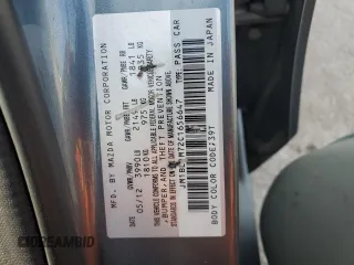 2012 Mazda 3 i Grand Touring with VIN JM1BL1M72C1656647, listed as a Copart auction lot 55590505 with 133,716 mi miles and Salvage title. Bid and sale history available at DreamBid. Image 12.