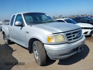 2002 Ford F-150 XL with VIN 1FTRX07242KA59876, listed as a IAAI auction lot 42673613 with 85,536 mi miles and . Bid and sale history available at DreamBid. Image 1.