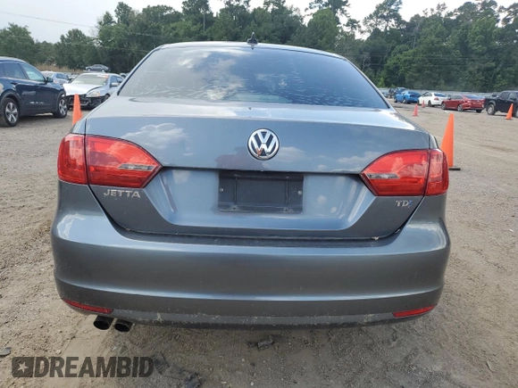 2014 Volkswagen Jetta TDI w/Premium with VIN 3VWLL7AJ4EM374570, listed as a Copart auction lot 63996195 with 186,497 mi miles and Salvage title. Bid and sale history available at DreamBid. Image 6.