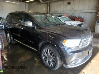 2014 Dodge Durango Citadel with VIN 1C4RDJEG6EC337284, listed as a Copart auction lot 46828485 with 133,812 mi miles and Salvage Title. Bid and sale history available at DreamBid. Image 4.