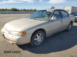 1995 Honda Accord EX w/Leather with VIN 1HGCD5651SA137738, listed as a Copart auction lot 77867994 with 246,999 mi miles and Clean Title. Bid and sale history available at carsss.com. Image 1.