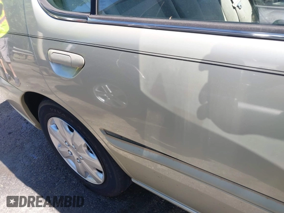 1998 Nissan Altima XE with VIN 1N4DL01D9WC159686, listed as a IAAI auction lot 42051686 with 219,699 mi miles and . Bid and sale history available at DreamBid. Image 17.