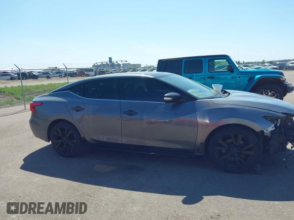 2018 Nissan Maxima SL with VIN 1N4AA6AP9JC360485, listed as a IAAI auction lot 42206521 with 140,898 mi miles and . Bid and sale history available at DreamBid. Image 13.