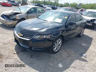 2016 Chevrolet Impala LT with VIN 2G1115S36G9167932, listed as a IAAI auction lot 42070171 with 126,668 mi miles and . Bid and sale history available at DreamBid. Image 2.