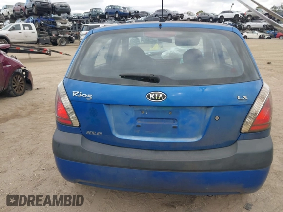 2009 Kia Rio LX with VIN KNADE243296494243, listed as a IAAI auction lot 41307888 with 133,487 mi miles. Bid and sale history available at carsss.com. Image 16.