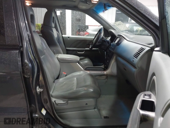 2005 Honda Pilot EX-L z VIN 2HKYF18715H564632, wystawiony jako IAAI lot #41685668 z przebiegiem 253 495 mil mil oraz . Historia ofert i sprzedaży dostępna na DreamBid. Obrazek 5.