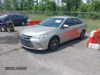 2016 Toyota Camry XLE with VIN 4T1BF1FKXGU259860, listed as a IAAI auction lot 42219507 with 239,145 mi miles and . Bid and sale history available at DreamBid. Image 17.