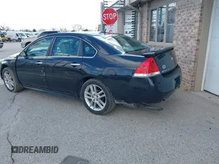 2012 Chevrolet Impala LTZ with VIN 2G1WC5E38C1185191, listed as a IAAI auction lot 41877040 with 99,315 mi miles and . Bid and sale history available at DreamBid. Image 3.
