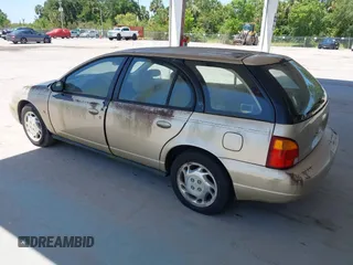 1997 Saturn SW z VIN 1G8ZK8277VZ368280, wystawiony jako IAAI lot #42269973 z przebiegiem 159 404 mil mil oraz . Historia ofert i sprzedaży dostępna na DreamBid. Obrazek 3.