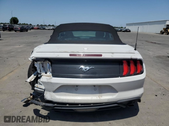 2020 Ford Mustang EcoBoost z VIN 1FATP8UH9L5111800, wystawiony jako Copart lot #59817955 z przebiegiem 79 304 mil mil oraz Czysty tytuł • Clean title. Historia ofert i sprzedaży dostępna na DreamBid. Obrazek 6.