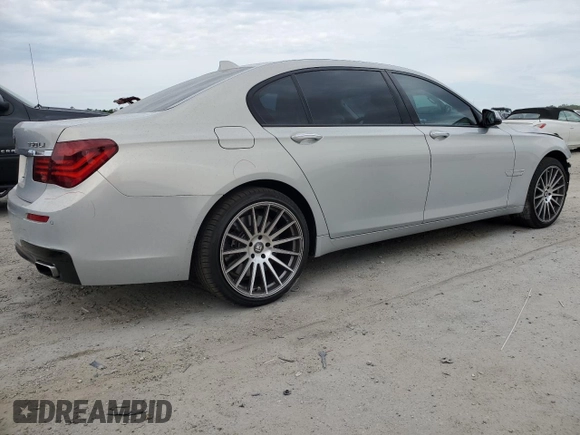 2015 BMW 7 Series 750Li z VIN WBAYE8C56FD781213, wystawiony jako Copart lot #55843955 z przebiegiem 63 899 mil mil oraz Szkoda całkowita • Salvage title. Historia ofert i sprzedaży dostępna na DreamBid. Obrazek 3.
