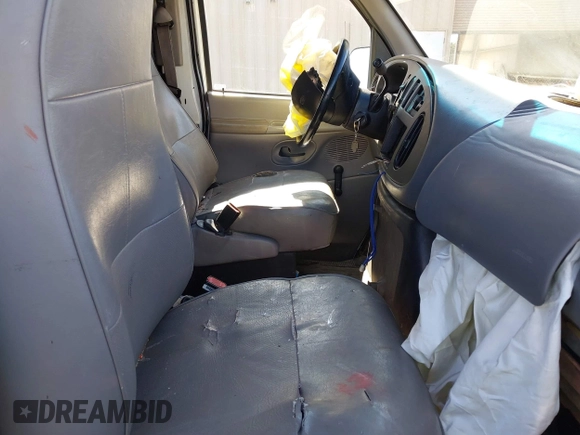 1999 Ford Econoline Cargo with VIN 1FTRE14W0XHB64440, listed as a IAAI auction lot 41645551 with 239,114 mi miles. Bid and sale history available at carsss.com. Image 5.