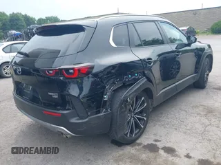 2023 Mazda CX-50 Meridian Edition with VIN 7MMVABXY1PN145913, listed as a IAAI auction lot 42632620 with 23,444 mi miles and . Bid and sale history available at DreamBid. Image 6.