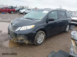 2015 Toyota Sienna XLE with VIN 5TDYK3DC8FS594765, listed as a IAAI auction lot 41730127 with 127,205 mi miles. Bid and sale history available at carsss.com. Image 18.
