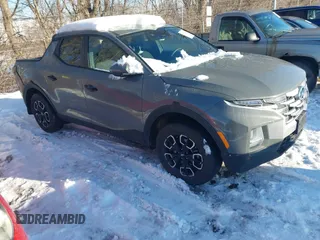 2023 Hyundai Santa Cruz SEL z VIN 5NTJBDAE9PH064245, wystawiony jako IAAI lot #41355379 z przebiegiem 39 585 mil mil oraz . Historia ofert i sprzedaży dostępna na DreamBid. Obrazek 1.